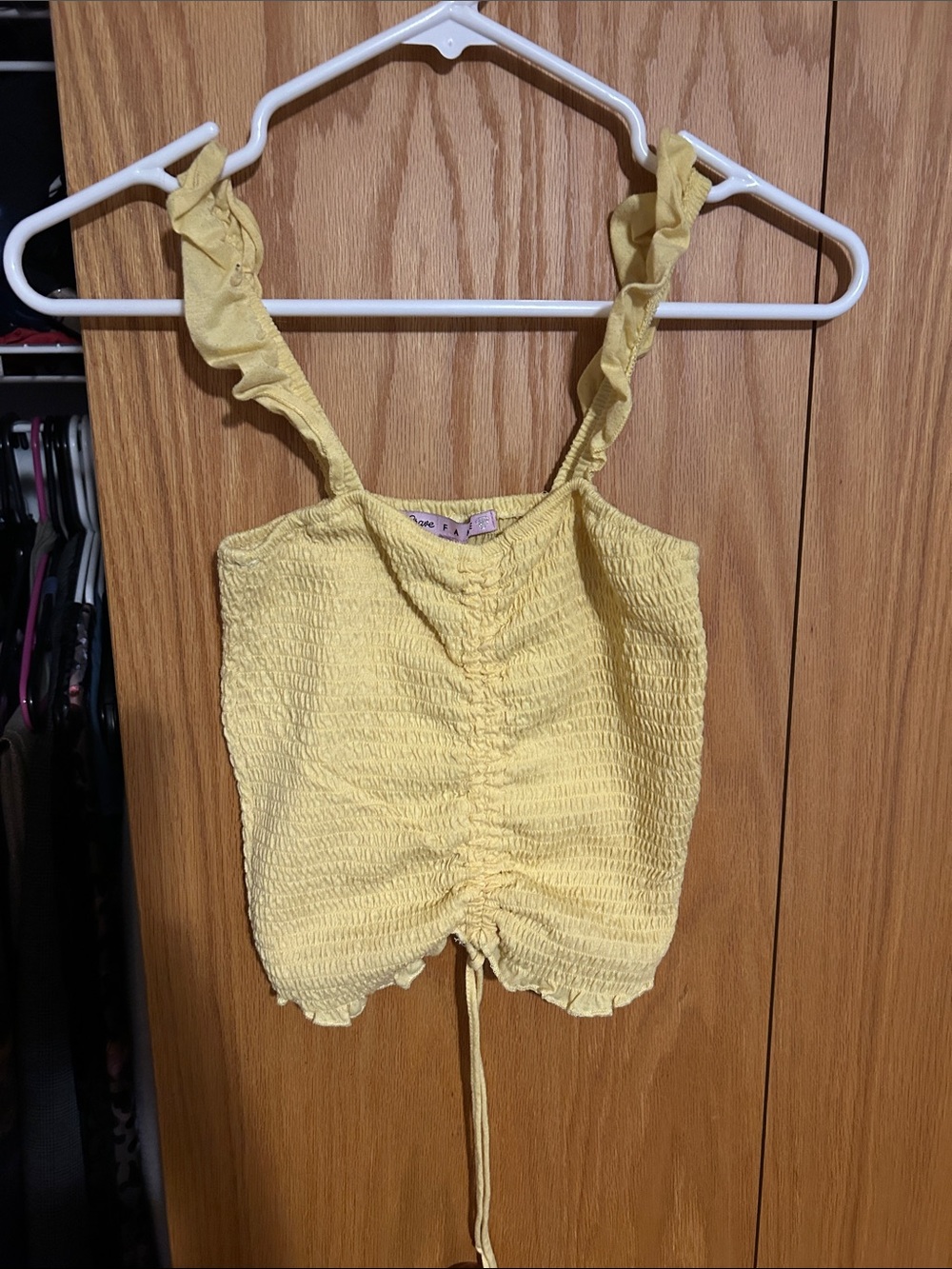 Crave Fame Yellow Ruffled Smocked Drawstring Crop Tank small